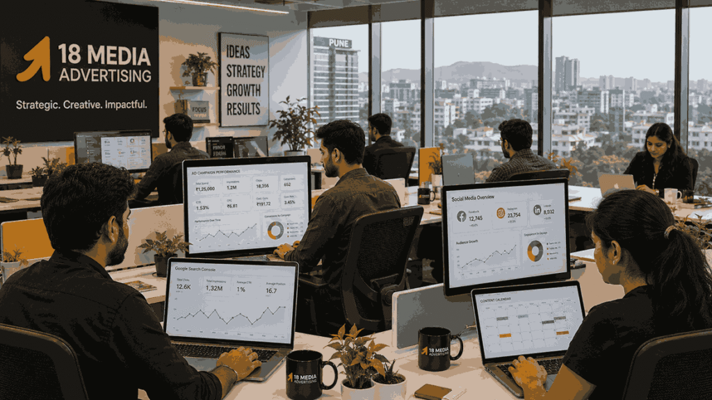 Digital Marketing Company in Pune team working on SEO analytics, social media dashboards, ad campaign metrics, and content calendars in a modern open-plan office.